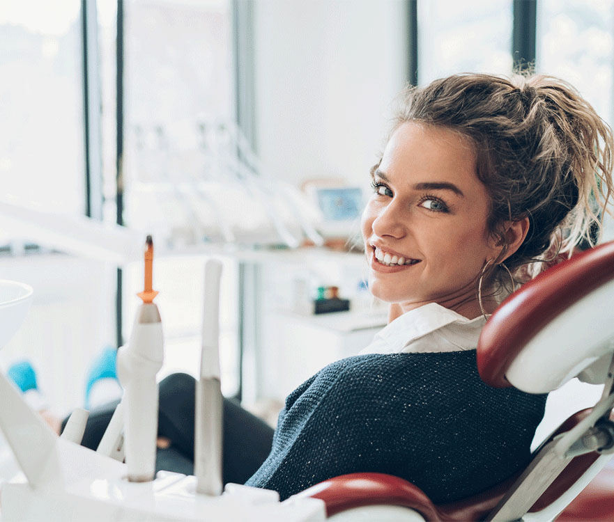 female patient smiling into the camera